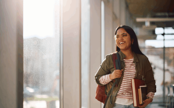 College student walking down hallway